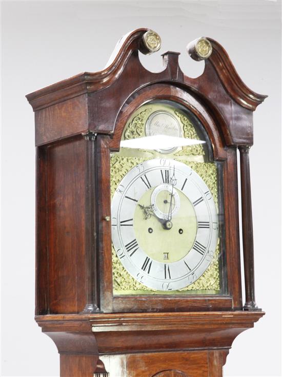 Mark Hawkins, St Edmunds Bury. A George III oak and mahogany eight day longcase clock, 6ft 11in.